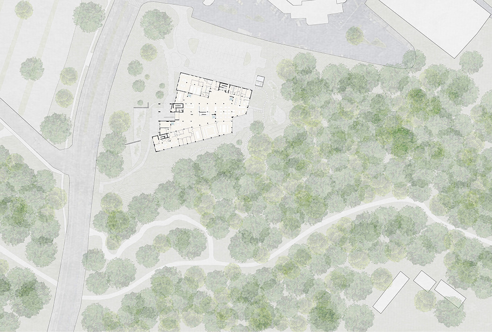 A site plan showing the building surrounded by trees and forest paths, with a parking lot to the north