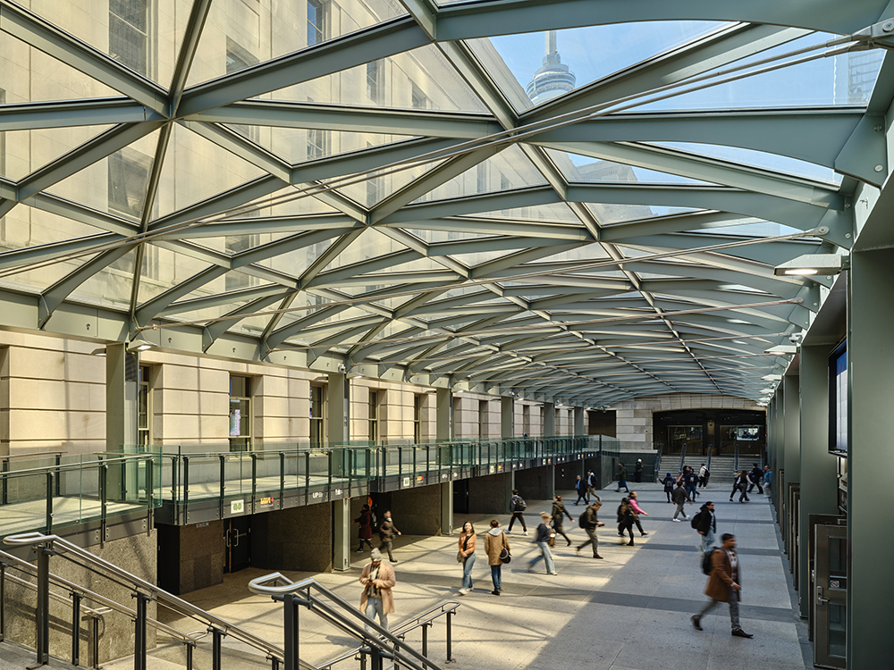 A canopy of interlocked triangles over a semi-enclosed walkway