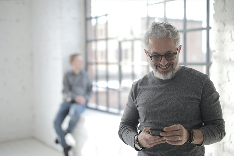 Man looking at his cell phone