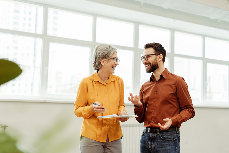 two individuals talking