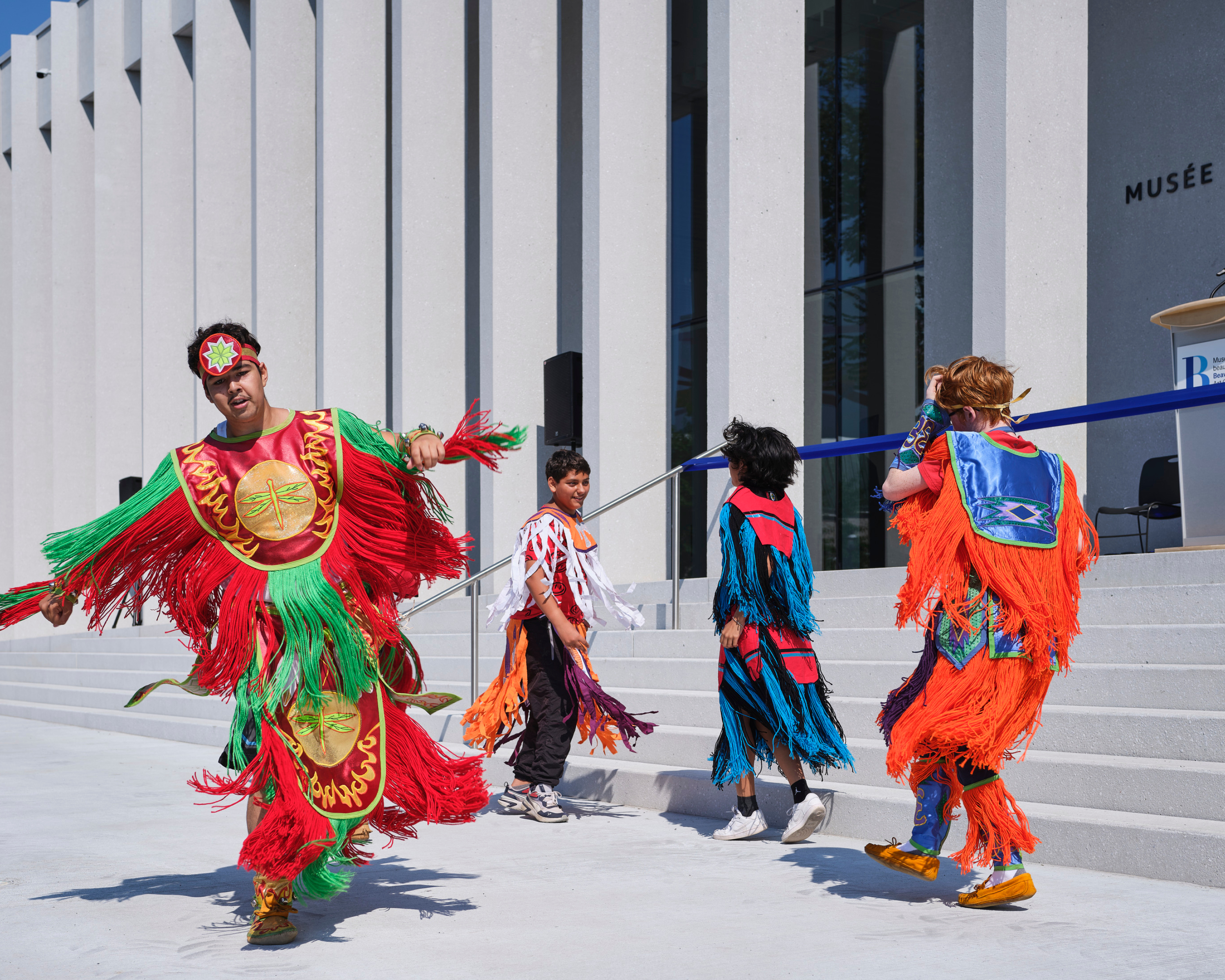 Exterior of pavilion embraced by diverse communities