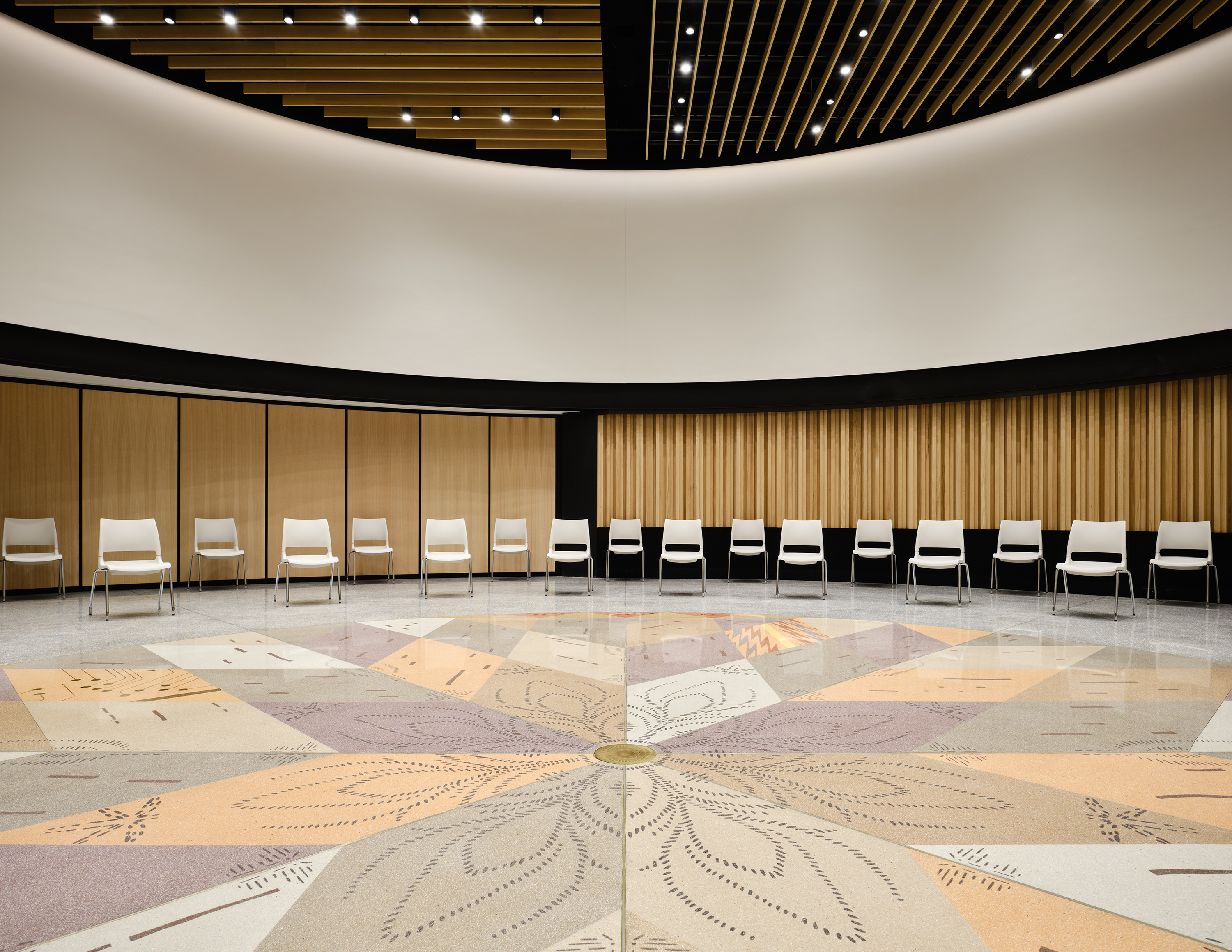 Floor of the Roundhouse Auditorium, featuring  ‘Morning Star’ by Anishinaabe/Nêhiyaw/British artist KC Adam