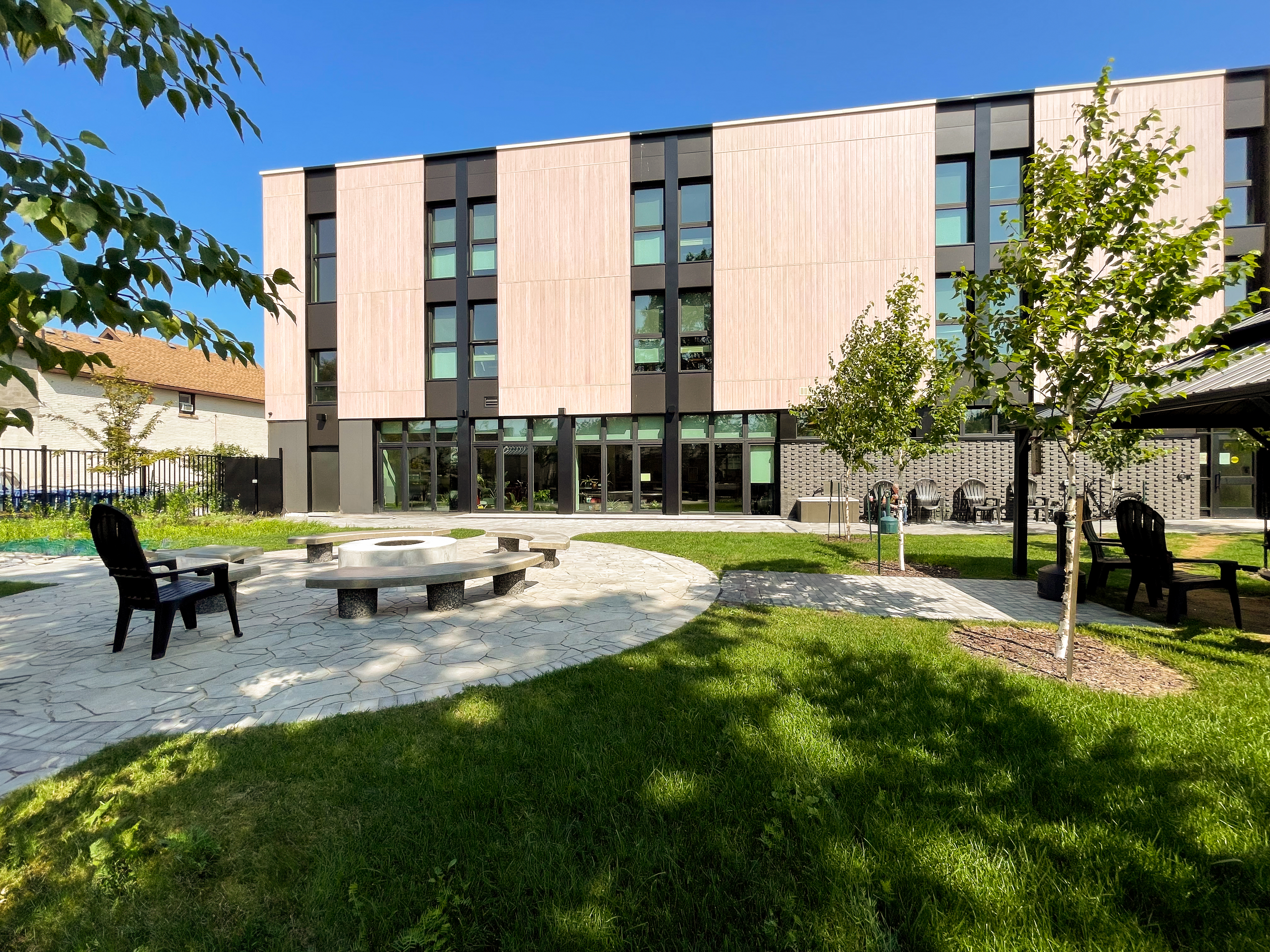 Green space located behind the building.